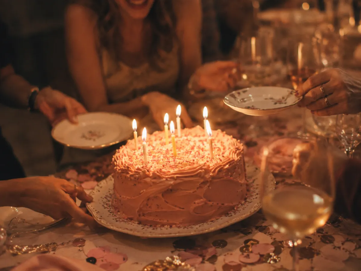 birthday guests using a QR code photo sharing experience for 80th Birthday Party Ideas: How One Family Captured Every Moment (Including Video Messages from Grandkids Abroad)