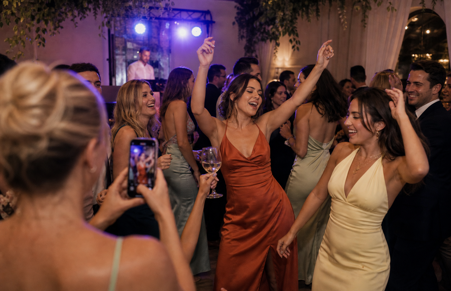 partie guests using a QR code photo sharing experience for New Year's Eve Photo Wall: How to Project a Live Gallery at Your Countdown Party